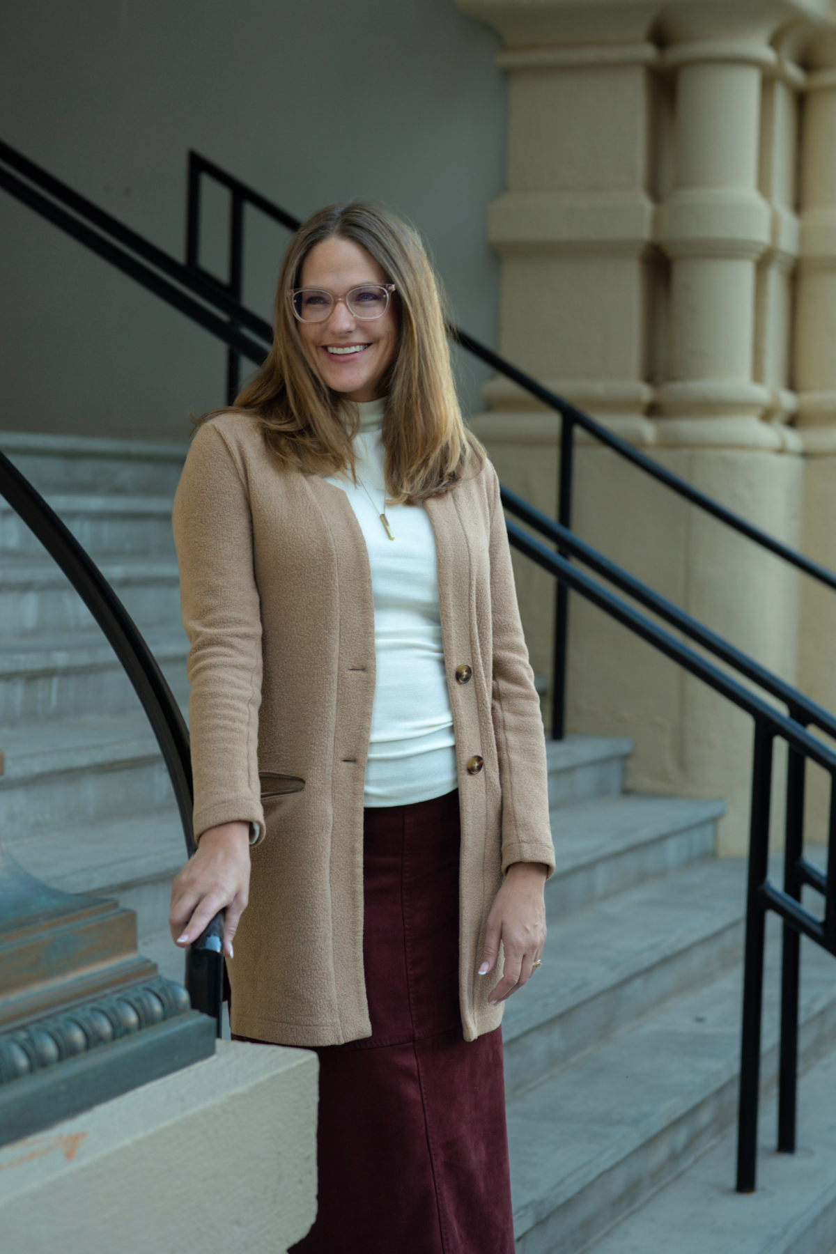 Julia LeFevre, executive leadership coach in Wichita, Kansas, standing outside